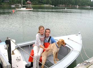 Christi Hadden, Eric Varney and Scout enjoying a moment in Bath, Maine. Christi joined MOFGA in order to enter the Common Ground Country Fair art contest, and won on her first try.