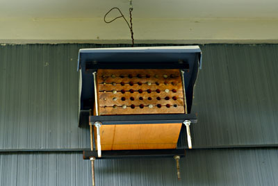 Fig. 8. A bee condo hanging under an eave.