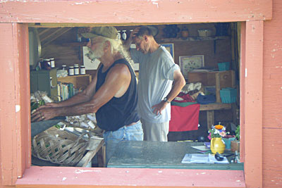 Peter Curra weighing vegetables