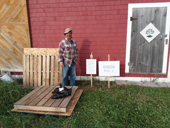 Don Pendleton, MOFGA building and grounds assistant, at MOFGA’s greenhouse plastic drop-off site in Unity. 