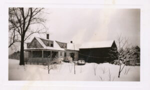 Benton farmhouse covered in snow