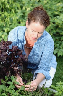 Emily Springer with Tulsi basil