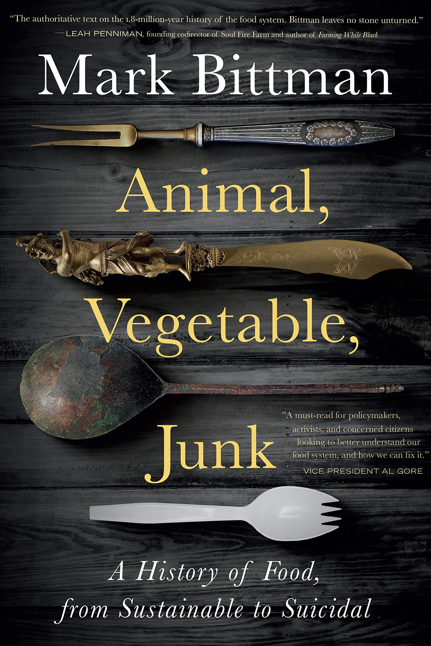 A dark book cover with alternating silverware from antiquity to a plastic sport with the title "Animal, Vegetable, Junk"