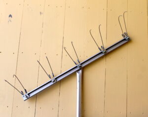 an adjustable wire weeder rake made from repurposed materials