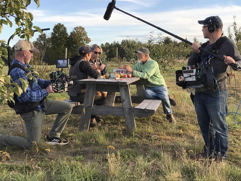 A crew filming at the Maine Heritage Orchard.