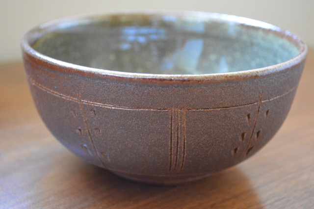 A purple pottery bowl.