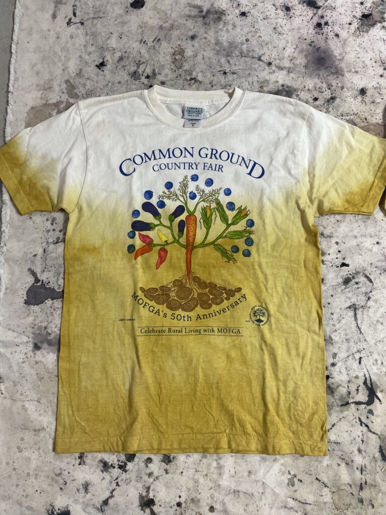 A Common Ground Country Fair T-Shirt dyed with botanical dyes.