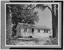 An old black and white photograph of a house.