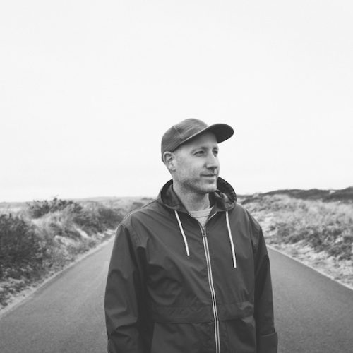 Pete Kilpatrick standing in an open road.