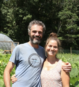 Two farmers smiling